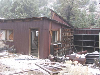 the roof has collapsed, exposing the shelves